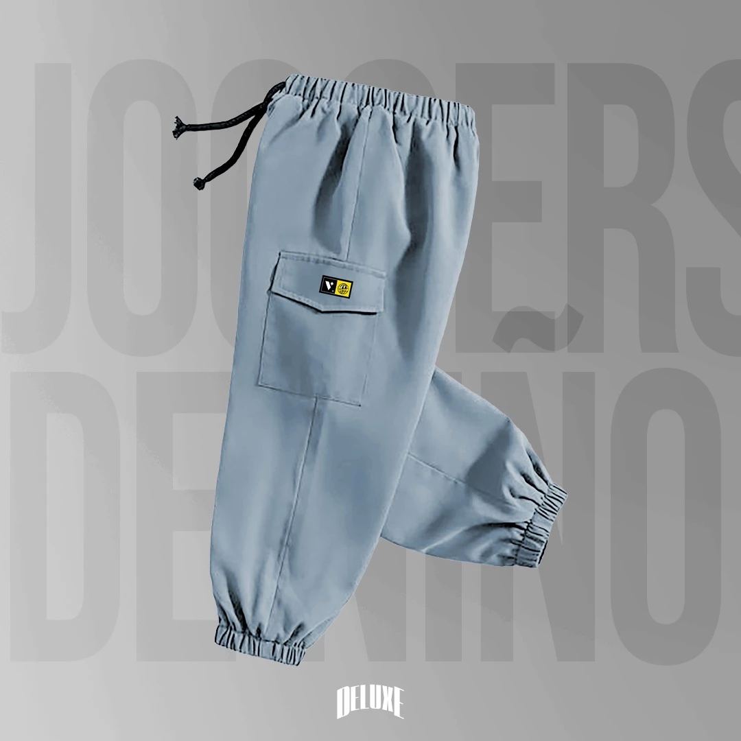 JOGGER NIÑO EN DRILL SUAVE AZULADO